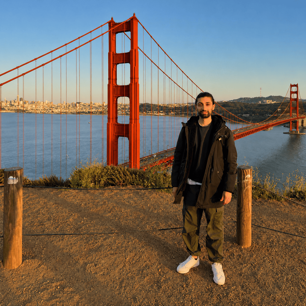 Orazio Rillo standing in front of the Golden Gate Bridge